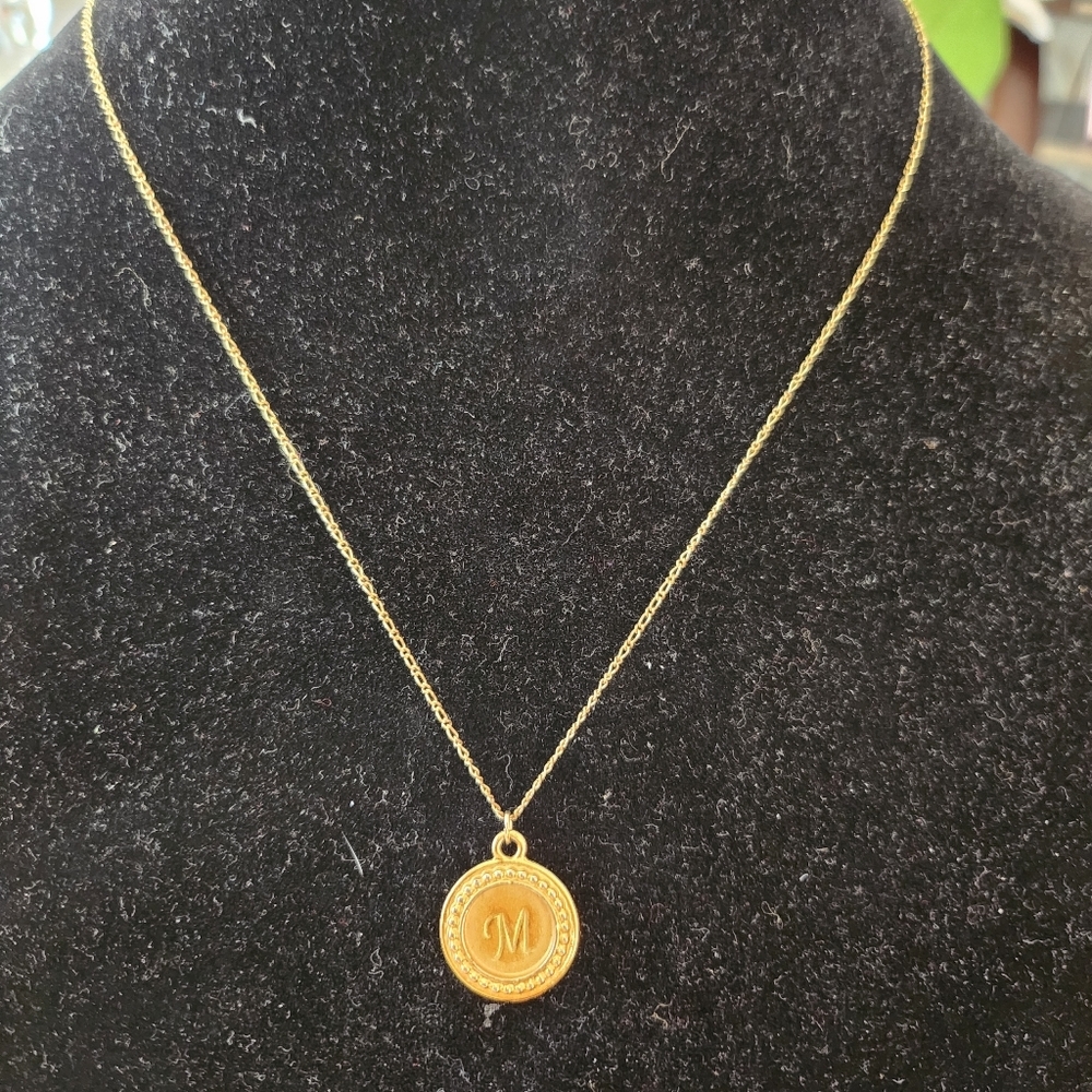 Gold necklace with M letter Pendant